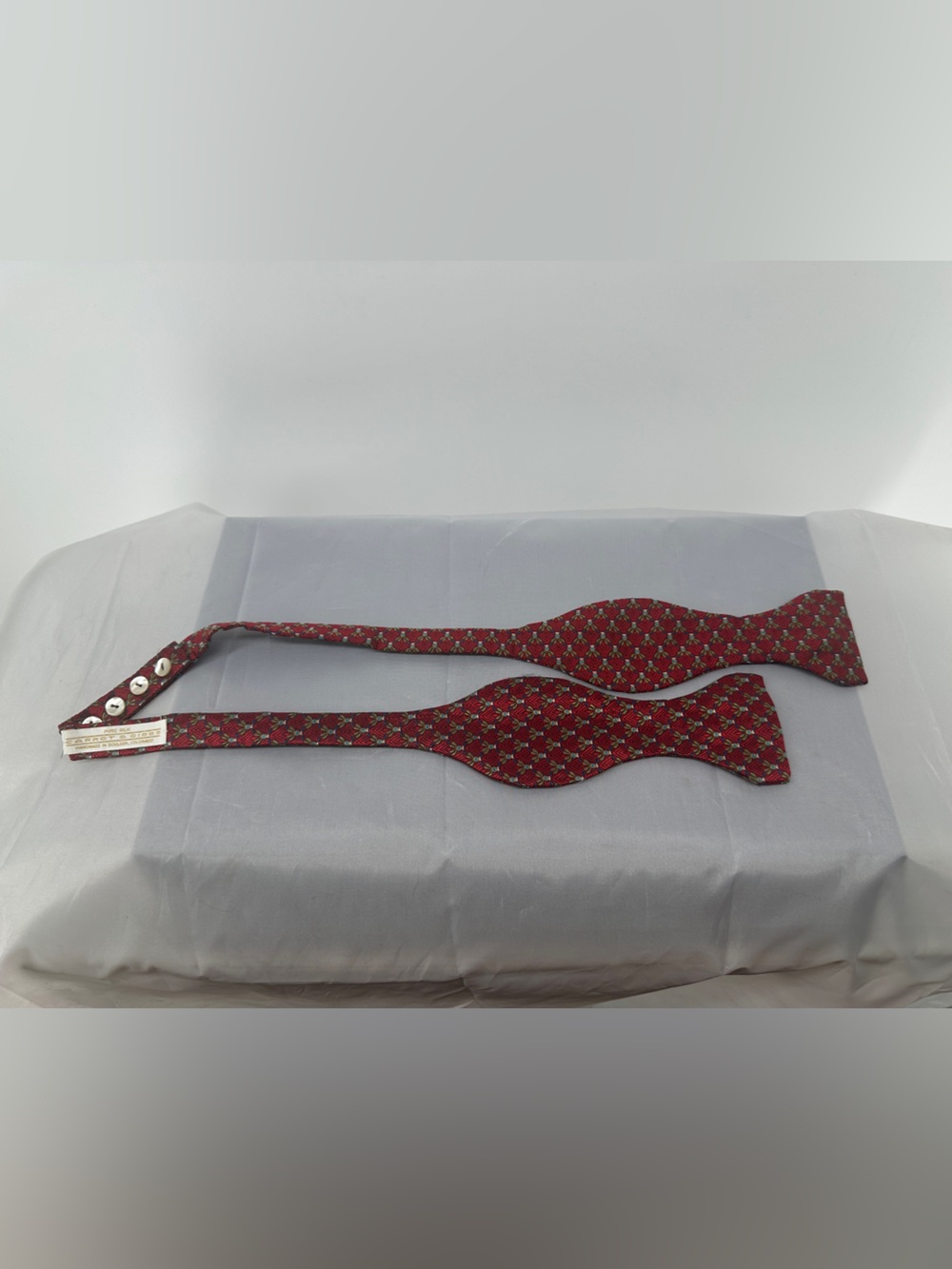 Carrot & Gibbe red jacquard patterned silk bow tie